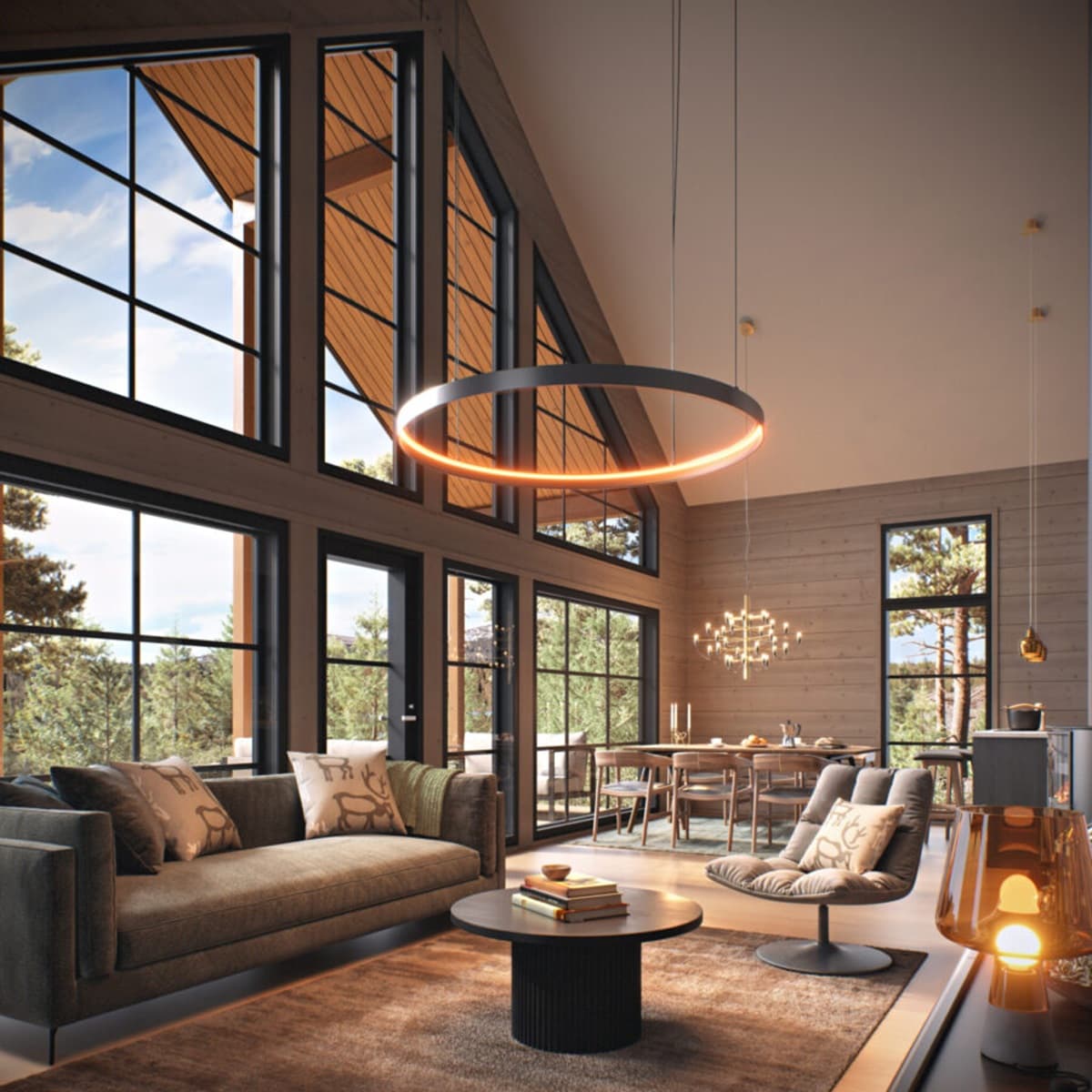 <p data-block-key="awz05">Rakennuksen päätyyn sijoittuva korkea keittiö–ruokailu–oleskelutila toimii kodin sydämenä. Suuret ikkunat ja korkea huonetila korostavat hirsihuvilan valoisuutta.</p>