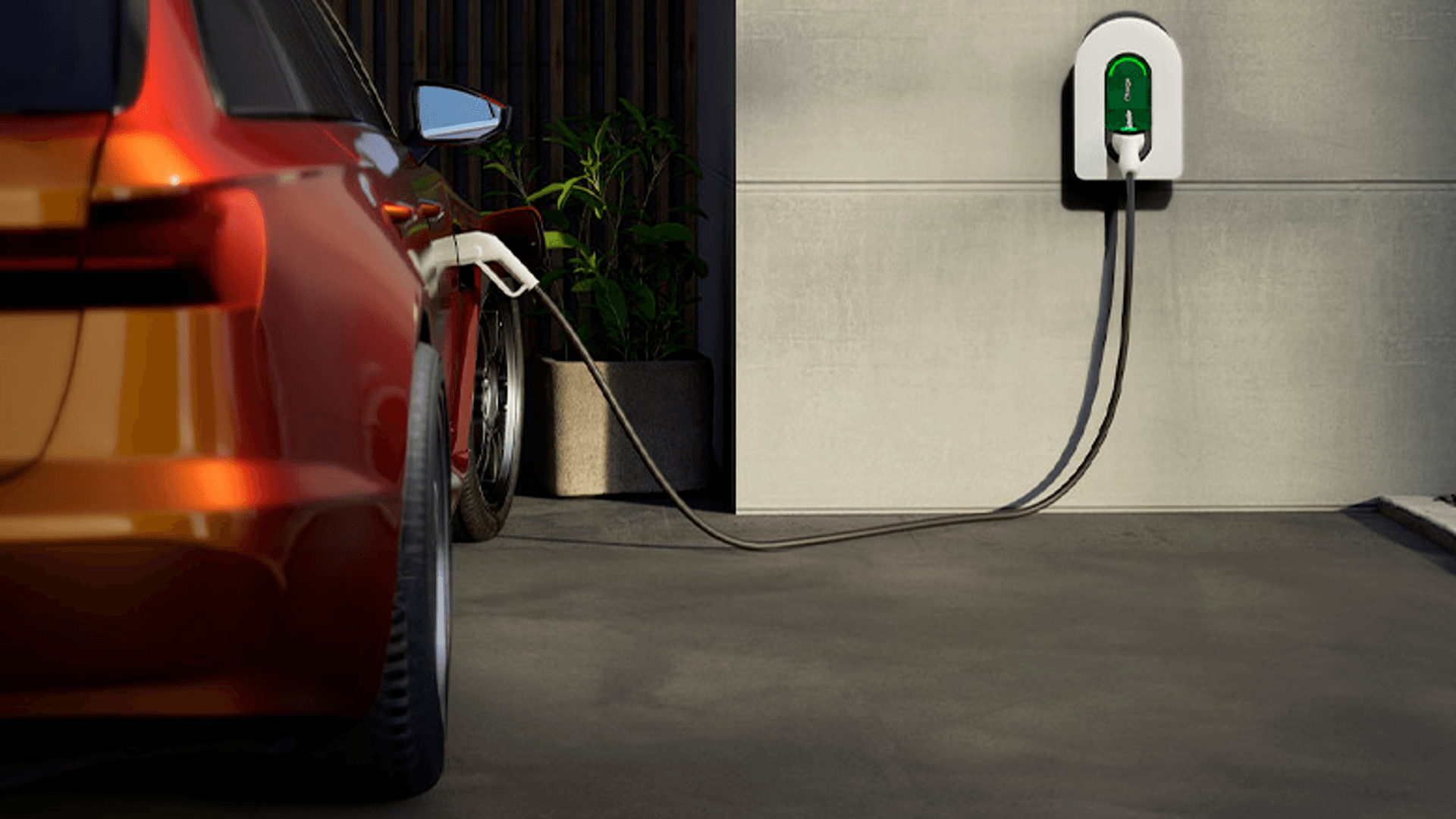 schneider latausasema autotallissa ja auto lataantuu