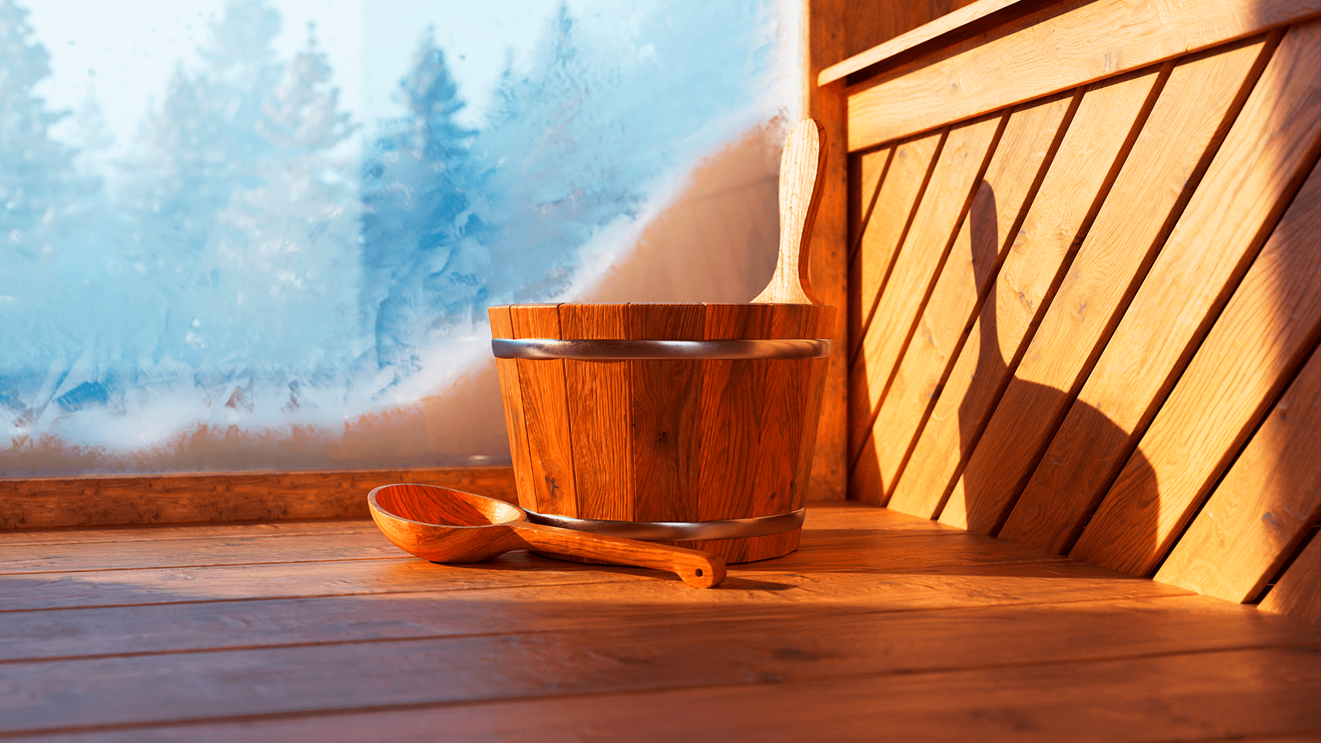 löylykauha ja sanko lauteilla. Ikkunasta näkyy luminen maisema