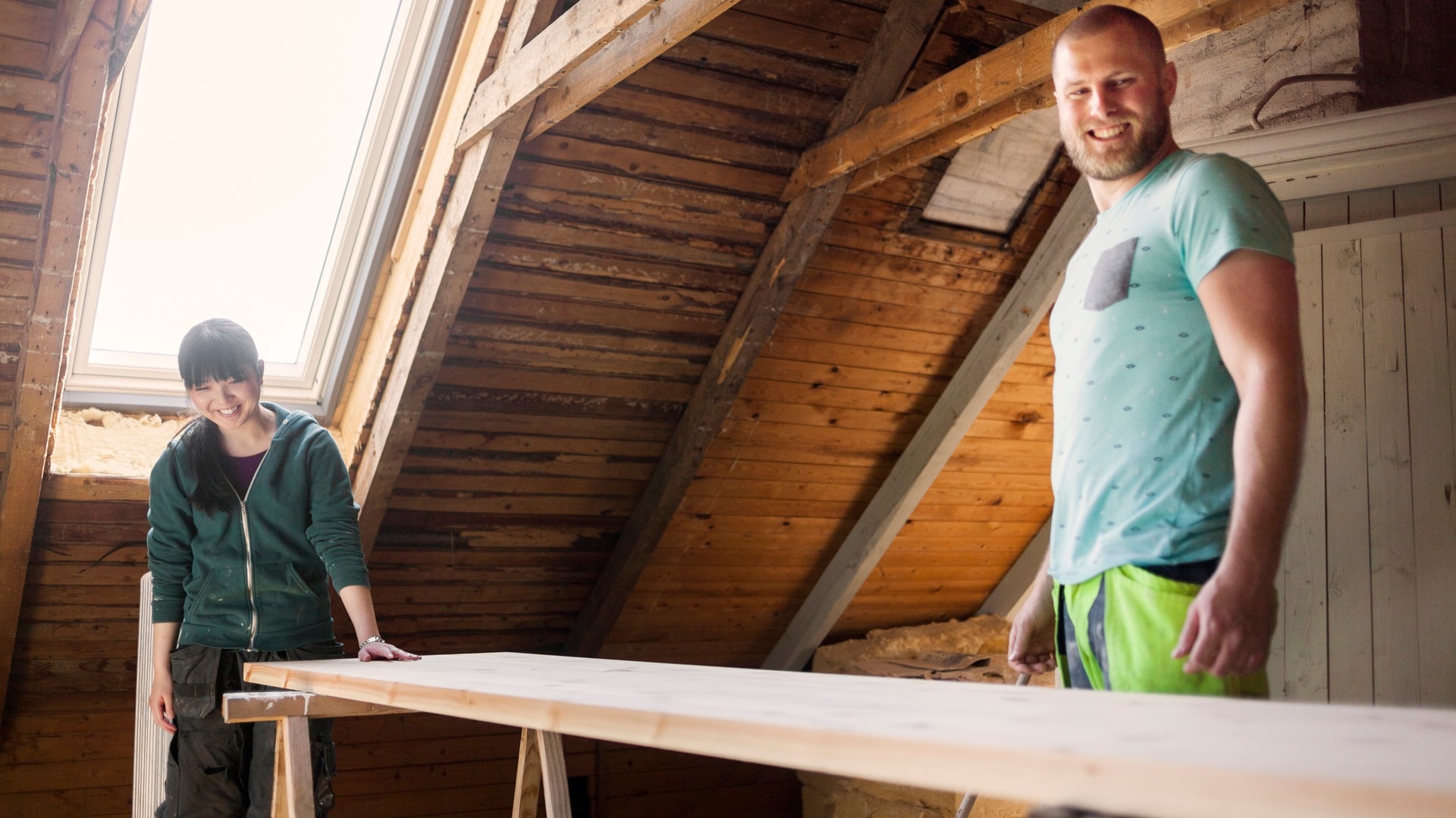 muoktwo-people-sharing-a-smile-in-a-cozy-attic-worksho
