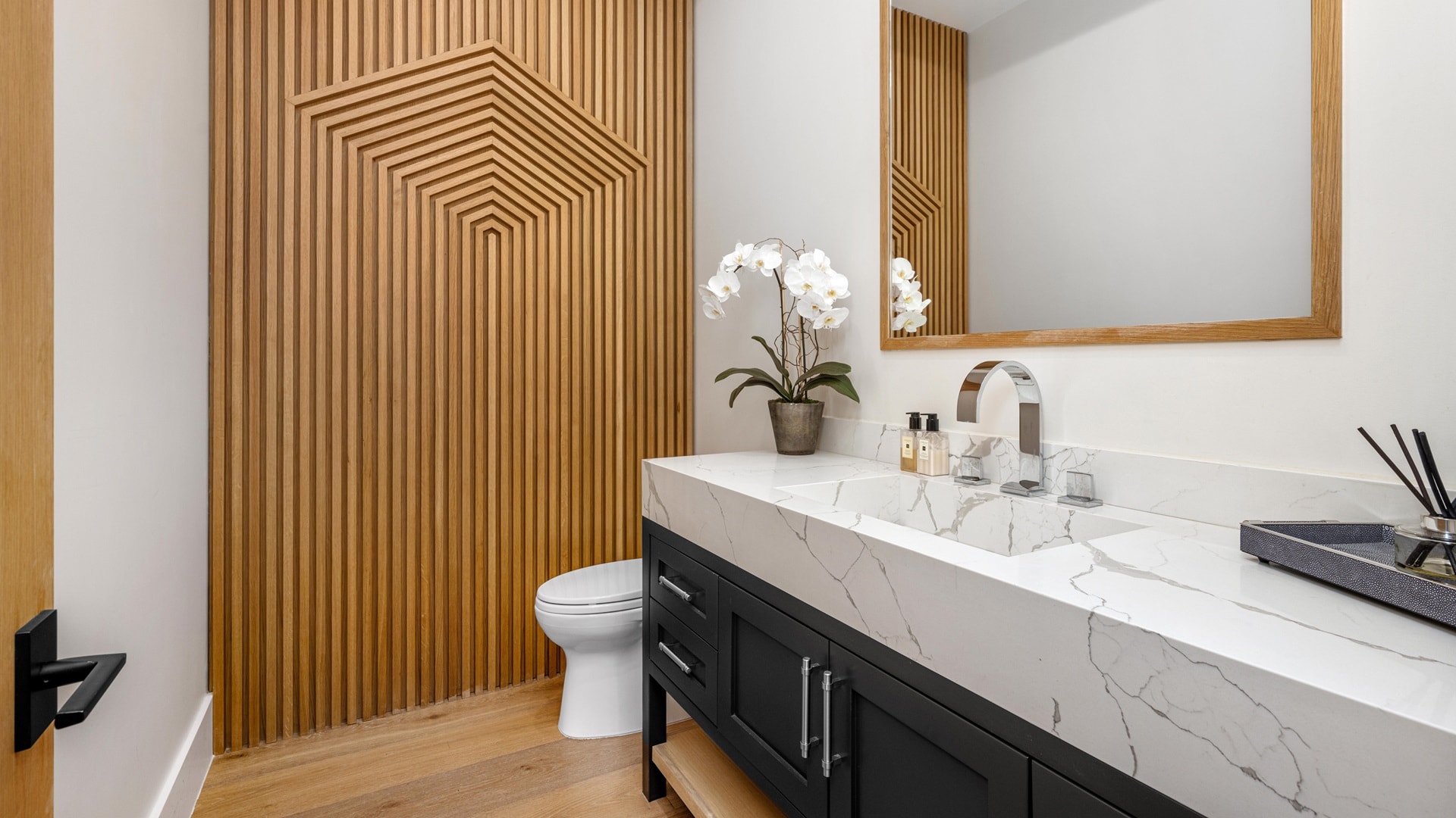 the-sink-counter-top-is-in-front-of-a-mirror-and-a-2025-02-10-06-08-40-utc